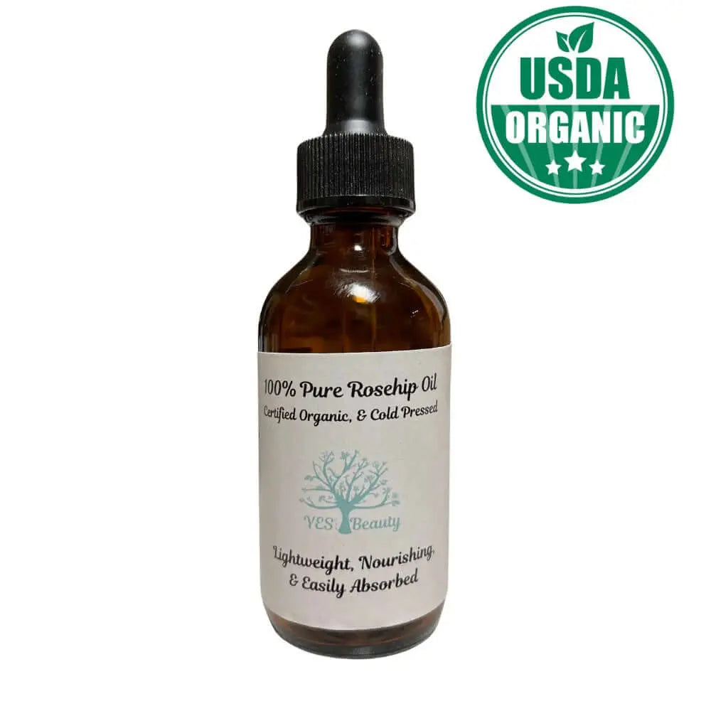 100% Pure Organic Rosehip Oil in a dropper bottle, cold-pressed for nourishing skin and hair, USDA certified organic.
